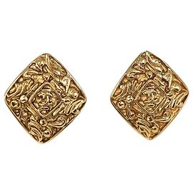 Boucles d'oreilles clip en diamant plaquées or CC doré Chanel Doré
