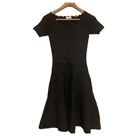 Sandro Kleid schwarz mit Strickdetails Schwarz
