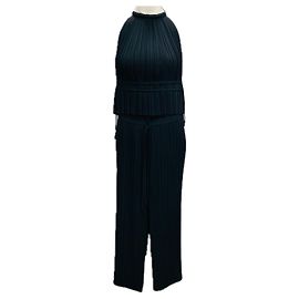 Schwarzes plissiertes Crop-Top von A.L.C. und Stella Midi-Rock Schwarz