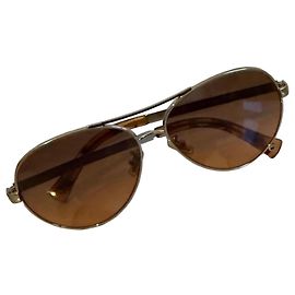 Gafas de sol Coach Castaño Dorado