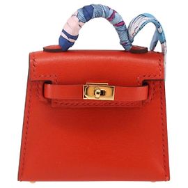 Charm de sac Kelly Twilly en cuir Hermès Orange