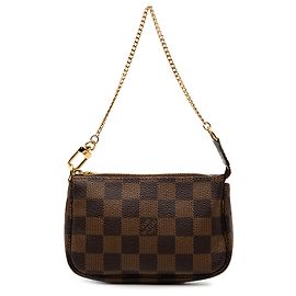Mini Pochette Accessoires Damier Ebene Marrom Louis Vuitton Marrom