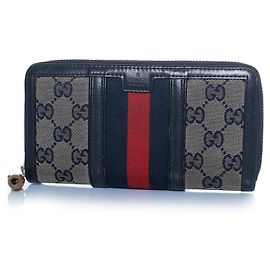 Gucci, monogram web wallet in blue Blue