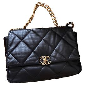 Bolsa Chanel Maxi 19 com aba Preto