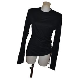 Pull Versace noir en viscose avec détails dorés Noir