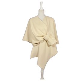 Autre Marque Poncho creme curto amarrado Cru