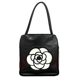 Sac 2 en 2 en agneau Camélia de Chanel Noir Blanc