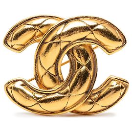 Broche CHANEL Matelassé Coco Mark en design plaqué or Doré