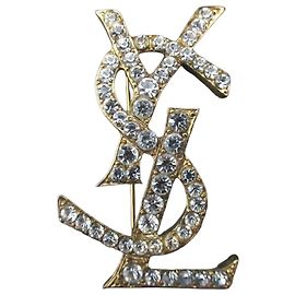 Broche vintage de Yves Saint Laurent con logo Cassandra de strass Dorado