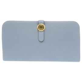 Comme neuf, portefeuille long Hermès Dogon (timbre P) avec quincaillerie dorée et doublure en Togo bleu. Bleu