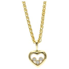 Collier Chopard Happy Diamonds YG / État du produit : A Poids : . Doré