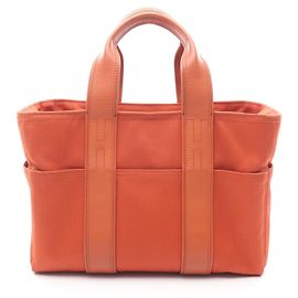 Bolsa tote Acapulco PM Hermès em couro com design em lona Chevron, marrom, feminina, Marrom
