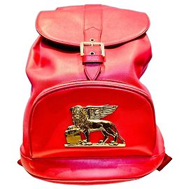 Mochila MCM roja con aplique de león Roja