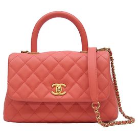 Sac à main Coco Handle XS en caviar rose de Chanel Rose