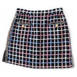 Saia de tweed de algodão e poliamida Chanel 22 Runway Preto Outro