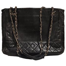 Chanel gesteppte schwarze Leder-Tote Schwarz