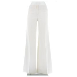 Chloé Calça branca flare com botões dourados Branco