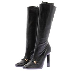 Saint Laurent Botas altas de cuero negro con detalles en oro Negro