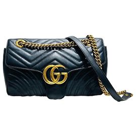 Gucci Bolsa de ombro GG Marmont matelassé com corrente Preto