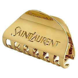 Saint Laurent Clipe de cabelo metálico em forma de meia-lua com logotipo assinado em dourado Dourado