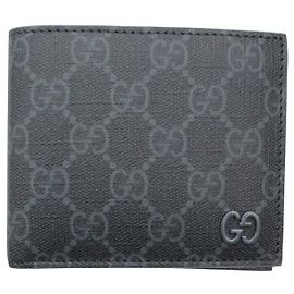 Gucci Portafoglio bifold da uomo GG Marrone