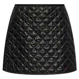 Moncler Minissaia acolchoada Preto