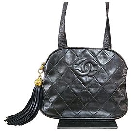 Chanel Bolsa transversal vintage com franjas Marrom