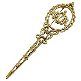 Goldplattierte Logo-Brosche Christian Dior Golden