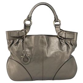 Salvatore Ferragamo Gancini Leather Doré