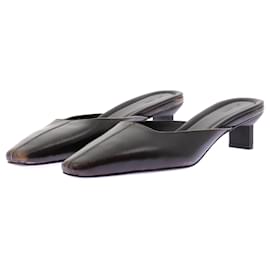 Autre Marque Schwarze Leder-Mules Schwarz