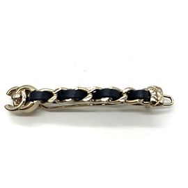Barrette Turnlock Coco Mark B21S de Chanel Noir