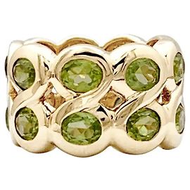 Autre Marque Bague bandeau or jaune et péridots. Autre