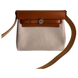 Hermès Herbag Mini Vache Hunter en cuir croisé beige Beige