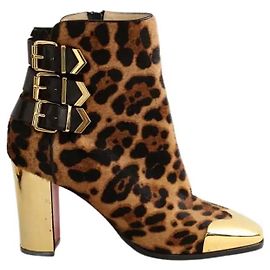 Christian Louboutin Botas de couro marrom com fivelas Marrom