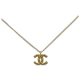 Collar de Hombre Chanel con la Marca Coco Beige Dorado
