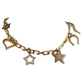 Superbe collier DOLCE & GABBANA doré avec des charms porte-bonheur Multicolore Doré