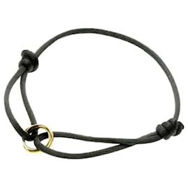 Bracciale Charm Code Trinity di Cartier D'oro