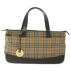 Burberry Nova Check
Lona Nova Check e couro Bege