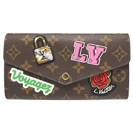 Portafoglio Sarah in Monogramma Marrone Louis Vuitton Marrone