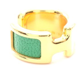 Hermès Boucles d'oreilles en cuir plaqué or Hermes Oran PM Doré Métallisé
