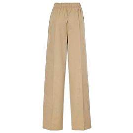 Pantalones de pierna ancha de algodón beige con placa de logo Prada Beige