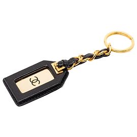 Charm per borsa in pelle e oro nero Chanel Nero