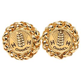 Boucles d'oreilles clip en médaillon de blé plaqué or CC doré Chanel Doré