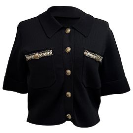 Maje kurz geschnittene kontrastierende Strickjacke aus schwarzer Viskose Schwarz