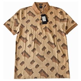 Autre Marque Boss Polo mit abstraktem Muster Braun Beige