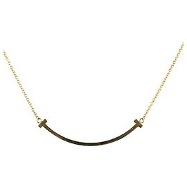Collier T Smile Small en or jaune 18K de Tiffany & Co. Doré