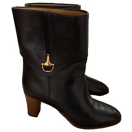 Black leather Gucci boots Black