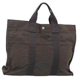 Bolso Hermès Her Line MM Gris