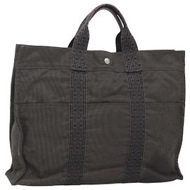 Bolso Hermès Her Line MM Gris