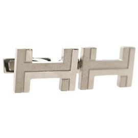 Pulsera rígida H Hermès plateada Plata